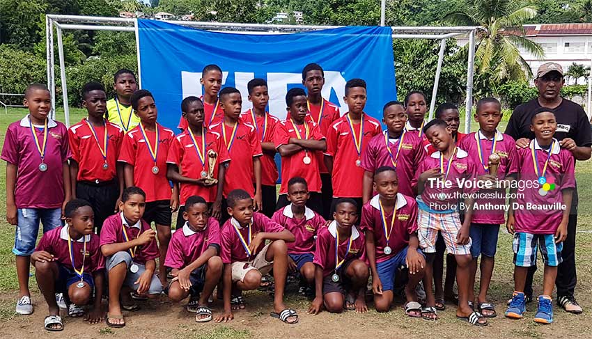 Image: A proud moment for Black Panthers (Soufriere) Under 11s finishing 2nd and Under 13s placing 3rd respectively.(PHOTO: Anthony De Beauville)  