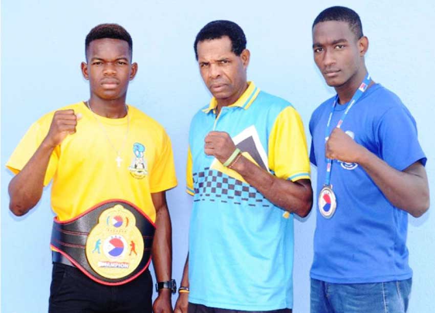 Image: (L-R) Kareem Boyce 60 kg champion, Conrad Frederick - National Boxing Coach and silver medalist Nathan Ferrari. (PHOTO: DP).  