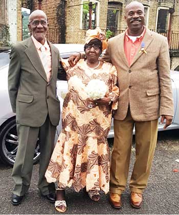 Image of Mr & Mrs Paul with their son Vitalis Louis (right).