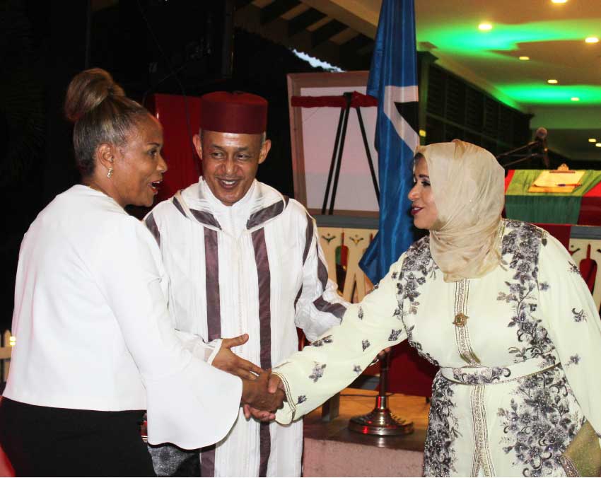 Image of Ambassador Kadmiri and wife greeting a guest at Tuesday’s celebrations.