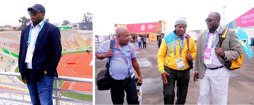 Image: (L-R) Minister of Youth Development and Sports, Edmund Estephane, checked out the similarities between the San Marcos Stadium-Cercado (background) and the stadium under construction in Soufriere; Freelance Journalist, Marius Modeste, Chef de Mission, David Christopher and Minister of Youth Development and Sports Edmund Estaphane at the Games Village. (PHOTO: Dave Pascal)