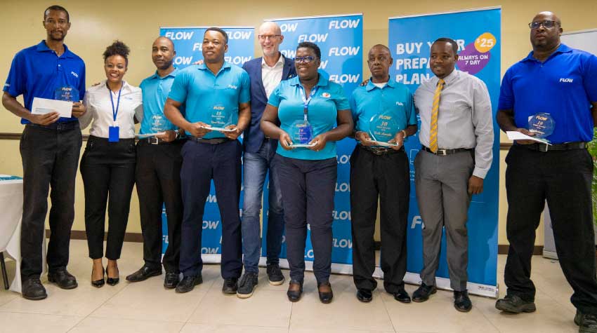Image: This week FLOW honoured nine team members for their long service to the company. 