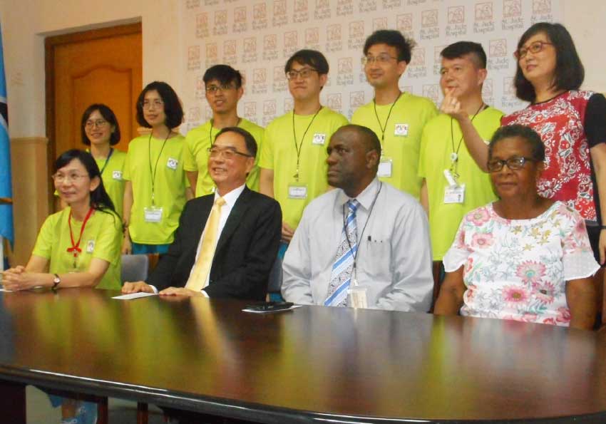 Image: Taiwanese medical volunteers (back row), Dr. Nina Kao, CEO of the Overseas Medical Mission Centre (front row, extreme left) and Ambassador of Taiwan, Douglas C.T. Shen (second from left). 