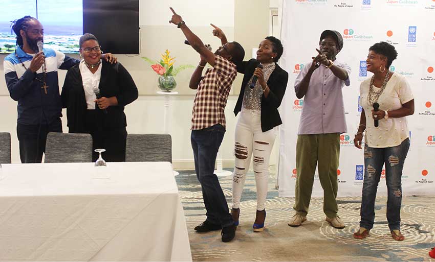 Image of Saint Lucian artistes performing Climate Change Calypso at J-CCCP Presentation at Harbor Club.