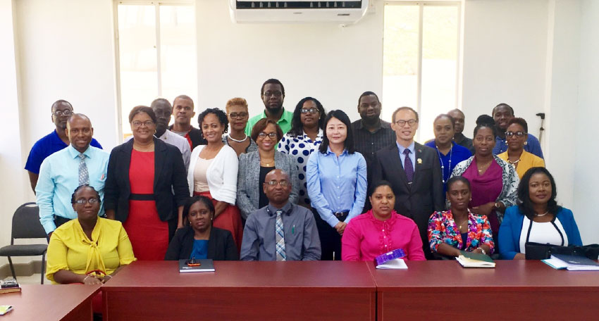 Image: Project Co-ordinator Joanna Huang and Chief of the Taiwan Technical Mission Mario Chen with representatives from the Ministry of Education as well as teachers and principals at a briefing held at the Ministry of Education’s Office in Goodlands.