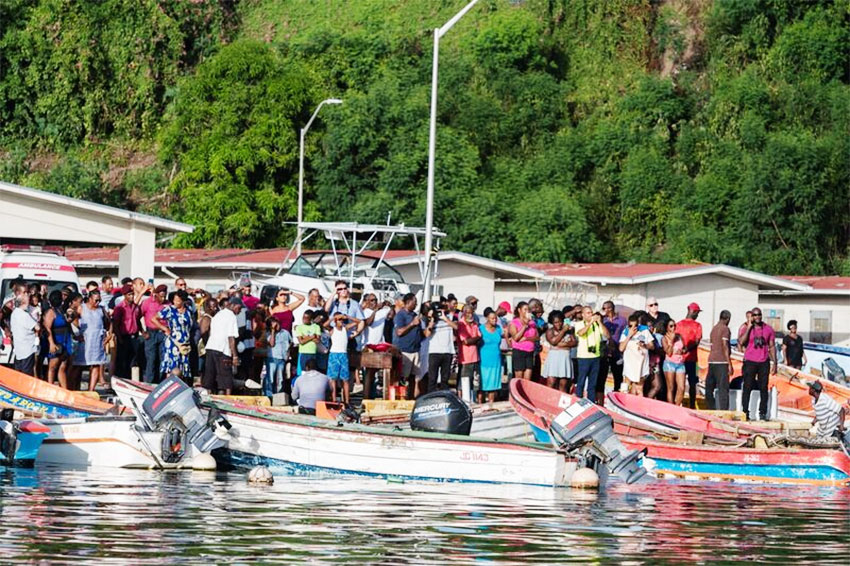 Image: Scores of the Bellamy Army on hand to congratulate and welcome him to the island