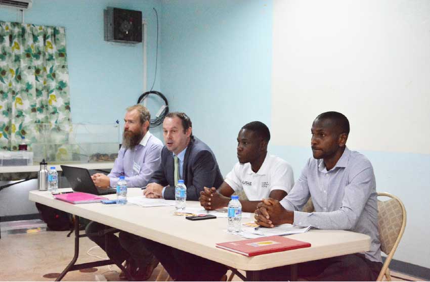 Image: UK Resident British Commissioner Steve McCready (second from left) addresses workshop opening. 