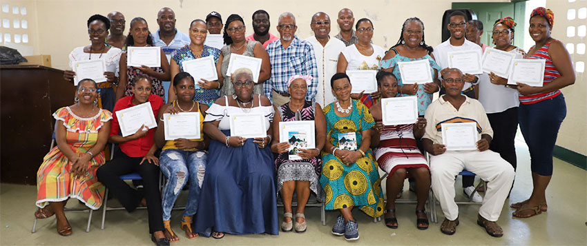 Image: Participants with their certificates of completion. 