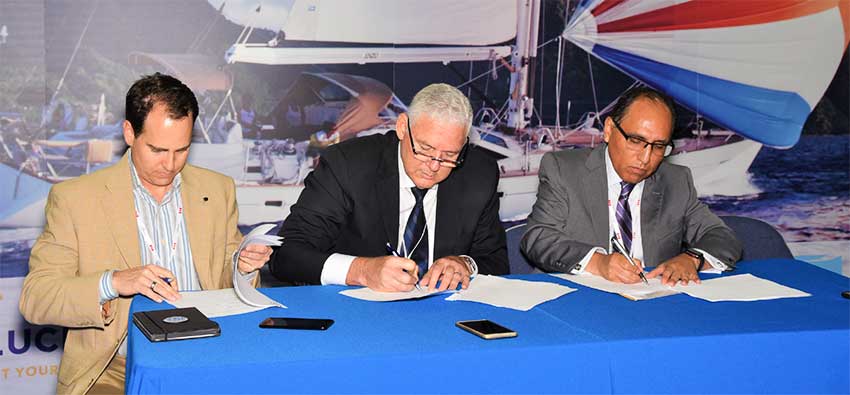 Image: Signing of MOU by Saint Lucia’s Prime Minister and representatives from Royal Caribbean and Carnival Corporation.