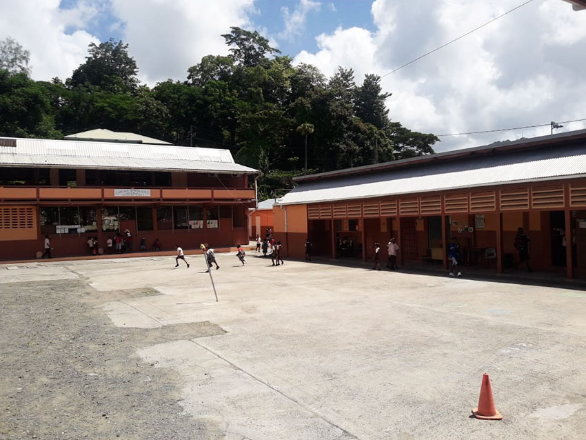 Image: an almost empty school play ground at the Gordon Walcott Methodist Combined 