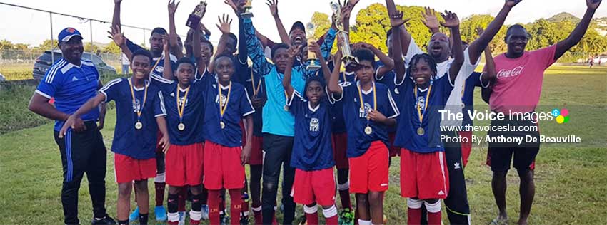 Image of a jubilant Flow Lancers FC Under 15 champion team. (PHOTO: Anthony De Beauville) 