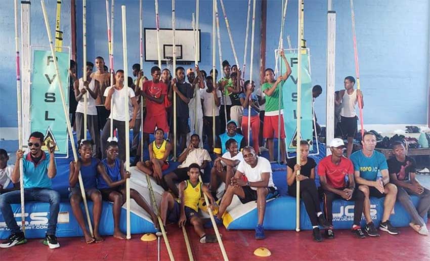 Image: Coaches, teachers and athletes take a time out for a photo moment following the training session. (PHOTO: AB)