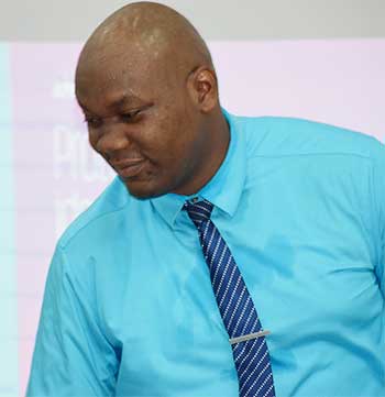 Image: Dilan Biscette, an accountant at KPMG, Spreading awareness on cyber security at the Corinth secondary School.