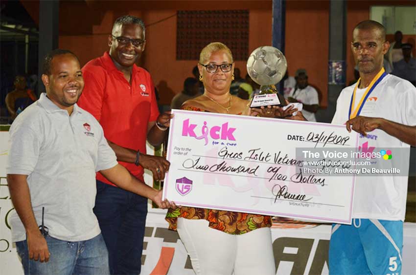 Image: (L-R) Garvin Niles – Tournament Director, Alvin Malaykhan – CEO Veterans In Sports Inc., Allison Belizaire Cancer patient and Sherman Sylvester - Captain Gros Islet Veterans Football Team. (PHOTO: Anthony De Beauville)