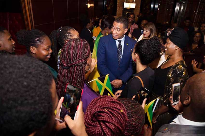 Image: Jamaican students from The University of the West Indies - China Institute of Information Technology (UWI-CIIT) greet Prime Minister of Jamaica, the Most Honourable Andrew Holness, ON, MP, during a private reception at the Mandarin Oriental, Shanghai (China) on November 3, 2019.