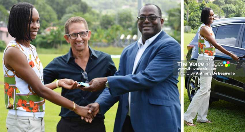 Image: (L-R) Levern Spencer receiving the keys from Sports Minister Edmund Estephane, while Larry Bain looks on. (PHOTO: Anthony De Beauville) 