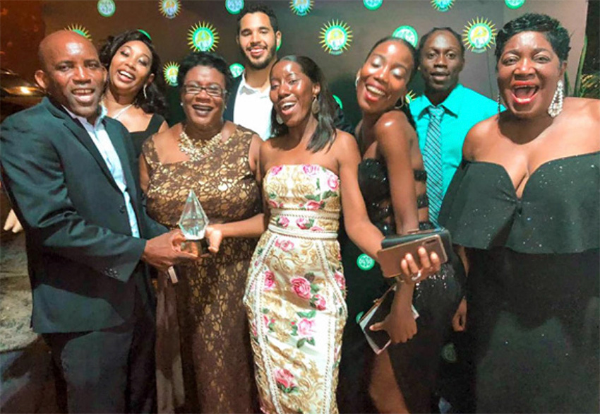 Image: Waltrude Patrick, General Manager of Bay Gardens Beach Resort & Spa (third from left), and Berthia Parle MBE, Retired General Manager (far right), celebrate with team members at the St Lucia Business Awards ceremony last weekend.