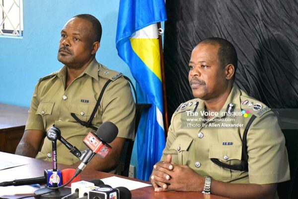 Image: Left to right: George Nicholas, Superintendent of Police, and Severin Moncherry, Police Commissioner addressing media personnel yesterday. [PHOTO: Allen Alexander]