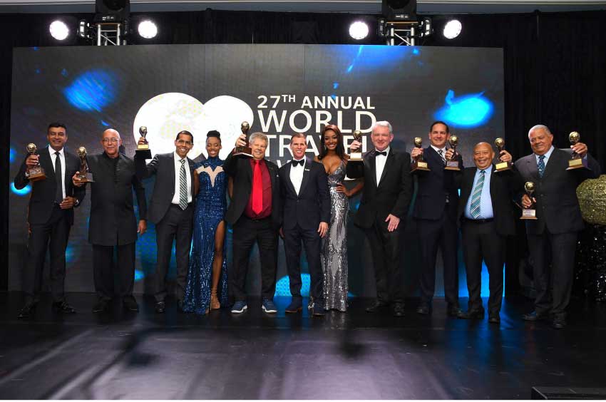 Image: Sandals representatives with their awards at the 27th annual World Travel Awards. 