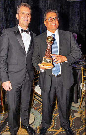 Image: Scott Hoskins, President of Sales and Marketing for Sailrock Resort (left) and Managing Director Kashmie Ali at the World Travel Awards.