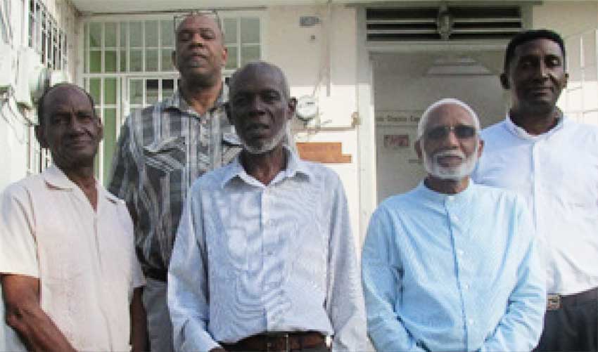 Image: Members of the steering committee instrumental in organising activities for the Year of the Bible, Pastor Sherwin Griffith, Pastor Waltrude Dantes, Pastor Andrew Sealy, Elder Robert Lee & President of the Gideons, Stephen Lambert. Beneath is Major Derek of the Salvation Army. Absent is Reverend Seth Ampadu of the Methodist Church.