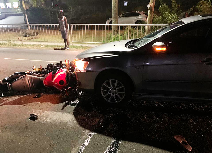 Image of Broken bike on road.