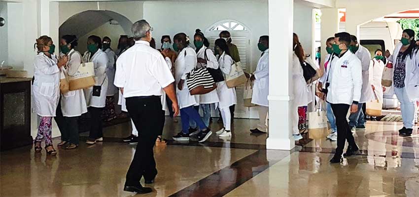 Image of Cuban doctors arriving at Sandals Regency La Toc Golf Resort & Spa. 