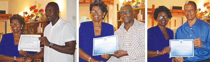 Image: (L-R) Dame Pearlette Louisy presenting certificates to St Rose Jacobie, Urban Augustin and Jeremiah Louis Fernand. (PHOTO: Anthony De Beauville) 