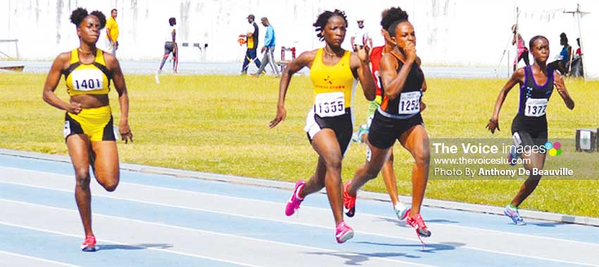 Image: (L-R) Women 100 metres, No. 1401- Narlia Albert (Pacesetters), No. 1355 - Kayla Thorpe (Morne Stars), No. 1252 - Jola Felix (Elite) and No. 1372 - Nikole Farrel (Nightriders). (PHOTO: Anthony De Beauville) 