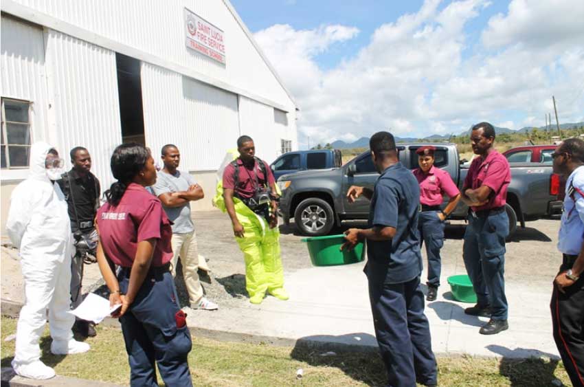 Image: Training of first responders on the method of proper decontamination of personnel equipment at the Fire Training School in Vieux Fort.