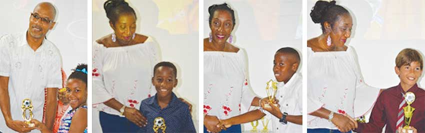Image: (L-R) ) Some of the young aspiring footballers receiving their awards. (PHOTO: Anthony De Beauville)