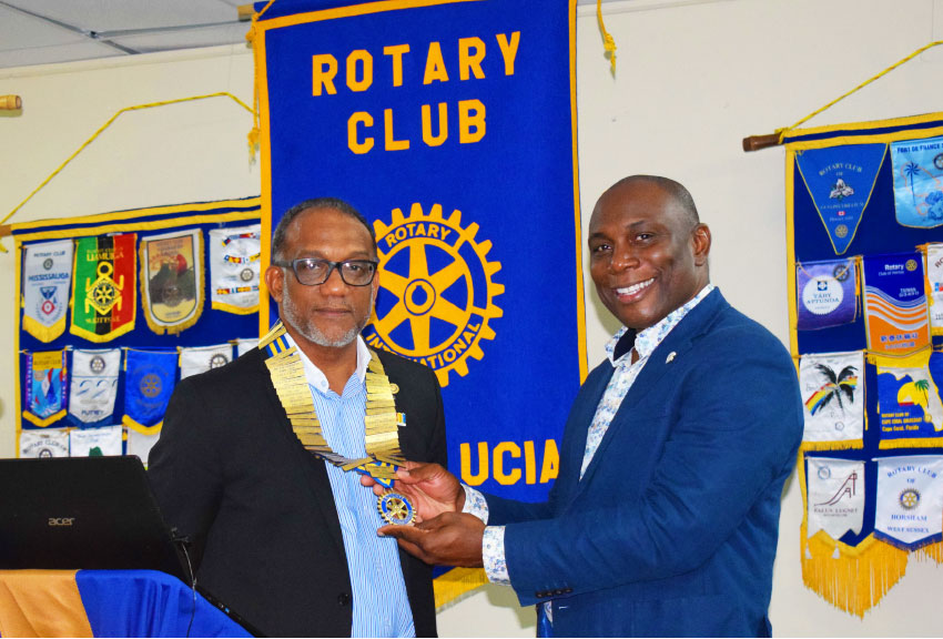 Image: President Leathon Khan (left) and Past President (Leevie Herelle) of the Rotary Club, Saint Lucia.