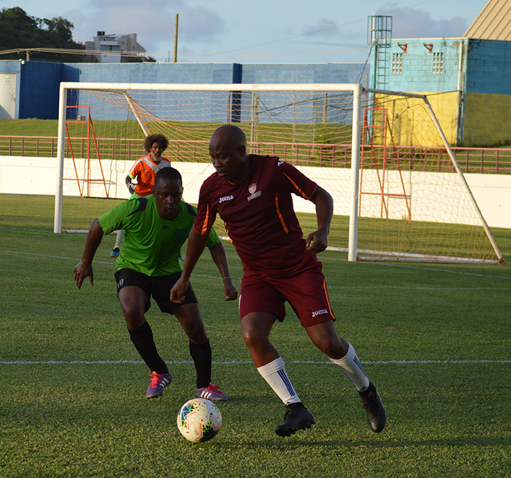 Image: Some of the action between Gros Islet Veterans and All Blacks – Dennery Veterans; (Photo: Anthony De Beauville)