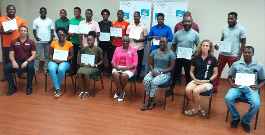 Image: CCCP P.E. teachers after having received their certificates pictured with SLOC Inc President Fortuna Belrose and Project Development Officer Andy Behl. (Photo: SLOC).