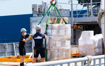 Image: Crew of the French Navy Ship Dumont d’Urville loading cargo from the CDEMA Integrated Regional Logistics Hub.