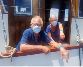 Image of Sailors donning their ‘Sailing with the Caribbean Bubble’ blue wristbands.