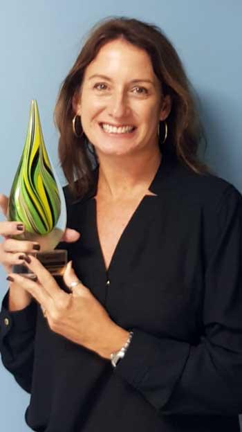 Image: Heidi Clarke, Executive Director, Sandals Foundation, poses with Agents’ Choice Award for “Favourite Responsible/Philanthropic Travel Foundation”. The announcement was made at the highly-anticipated Canadian travel industry virtual Gala held on October 1, 2020.