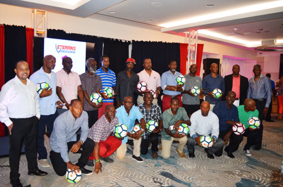 Image: A photo moment for Tournament Director, Garvin Niles standing first from left; CEO Alvin Malaykhan standing far right and representatives from the 19 participating teams. (PHOTO: Anthony De Beauville)