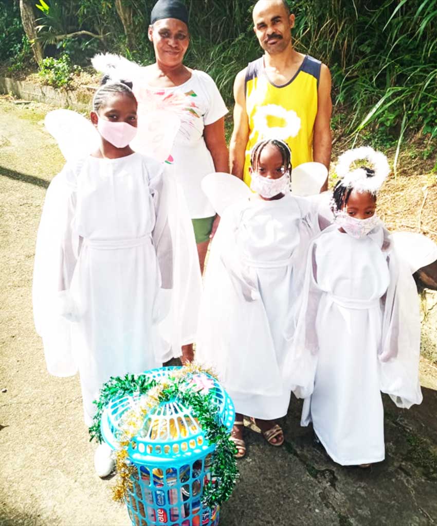 Image of Little Angels delivering donations to family.