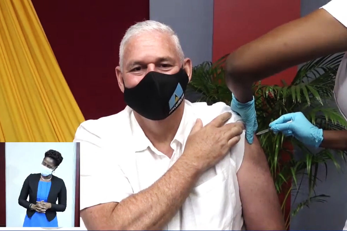 Image of Prime Minister Allen Chastanet receiving COVID-19 vaccine