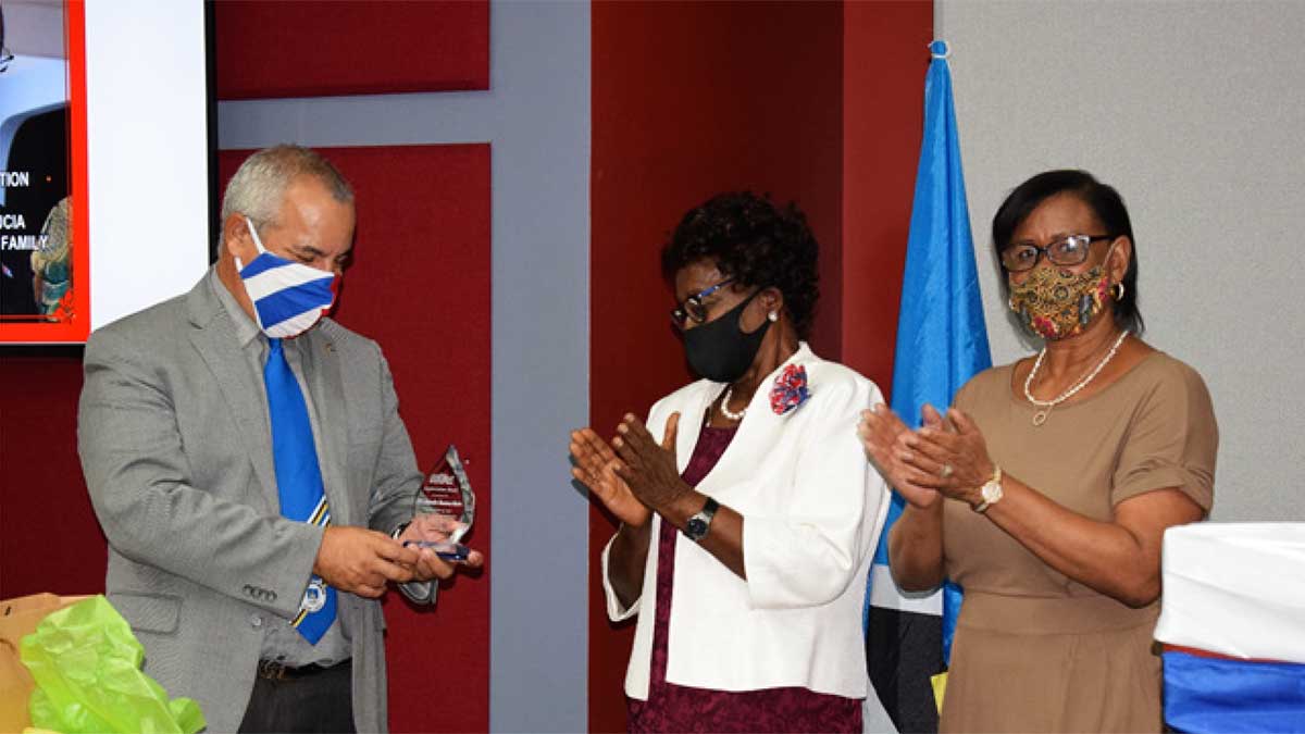 Image: Cuban Ambassador Marin (left) was thanked for his short tour of duty in Saint Lucia by former Governor General Dame PearletteLouisy (center) and HSA President Marlene Alexander