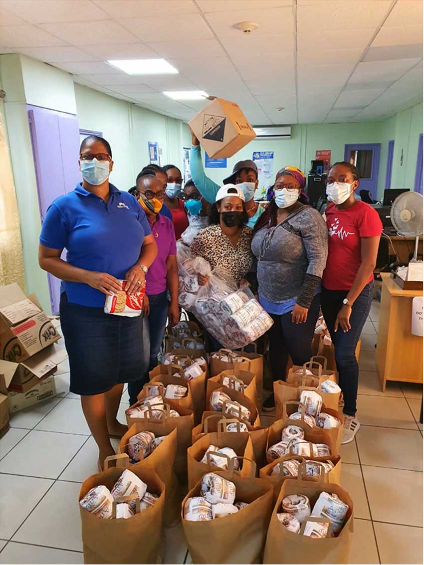 Image of Team Vincy with care packages for its members