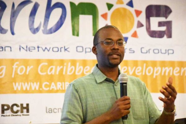 Image of CaribNOG Executive Director Bevil Wooding Speaking at a CaribNOG Meeting in 2019.