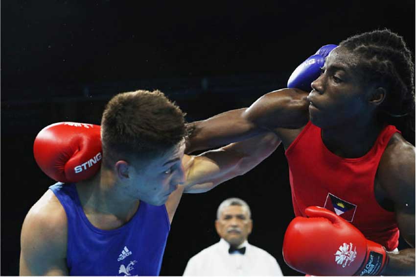 Ryan Alston of Antigua & Barbuda competes against William Edwards of Wales. [Picture by Getty Images]