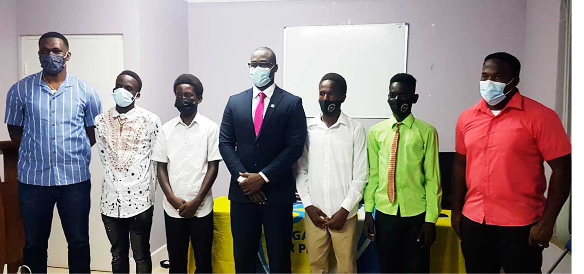 Image: (L-R) 1st Vice President GIFL, Chard Desir, Rickelme Lionel, Lyndon Constantine, Parliamentary Representative for Gros Islet, Kenson Casimir, Taye Peter, Samaiel Louison and President GILF, Shayne Paul. (Photo: Anthony De Beauville)