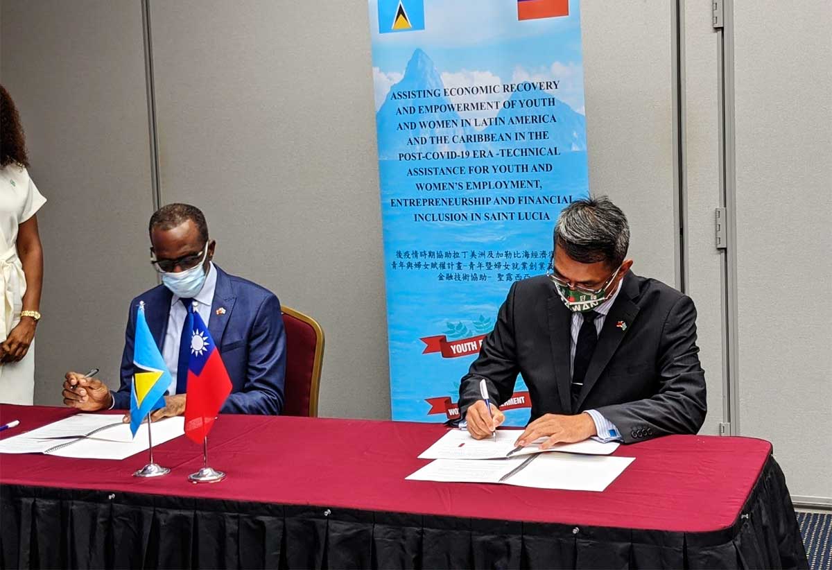 Prime Minister Pierre and Taiwan’s Ambassador to St. Lucia H.E. Peter Chen signing documents which will fund the Youth Economy Project