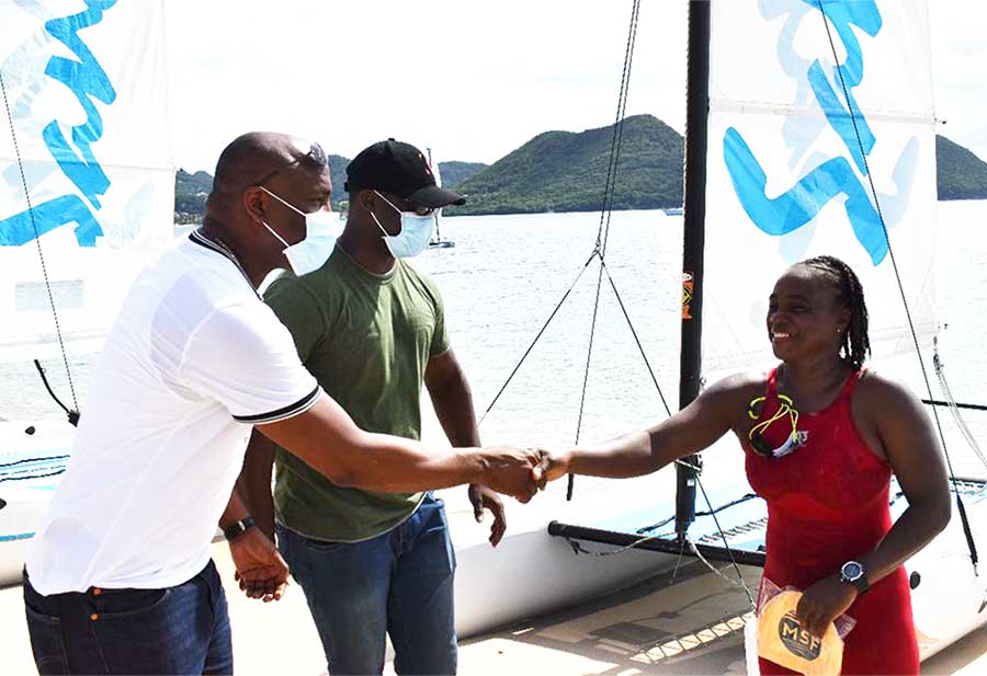 Sports Minister now Education Minister Shawn Edward relayed Saint Lucia Prime Minister Phillip J. Pierre's congratulatory message to Eugene (Photo: Anthony De Beauville) 