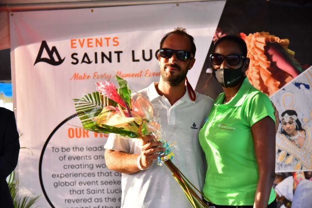 Captain Federico Dosso was presented with a bouquet by CEO of ECSL, Lorraine Sidonie