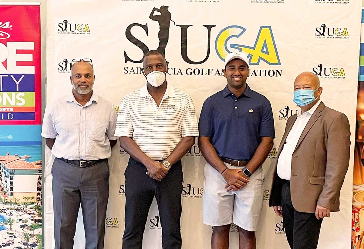 L-R: Dr. Naveen Urs – Father of Yadhu Urs, Dr. Kent Glace – President of the Saint Lucia Golf Association, Yadhu Urs – Saint Lucian Golfer, Mr. Winston Anderson – Managing Director Sandals Resorts EC.