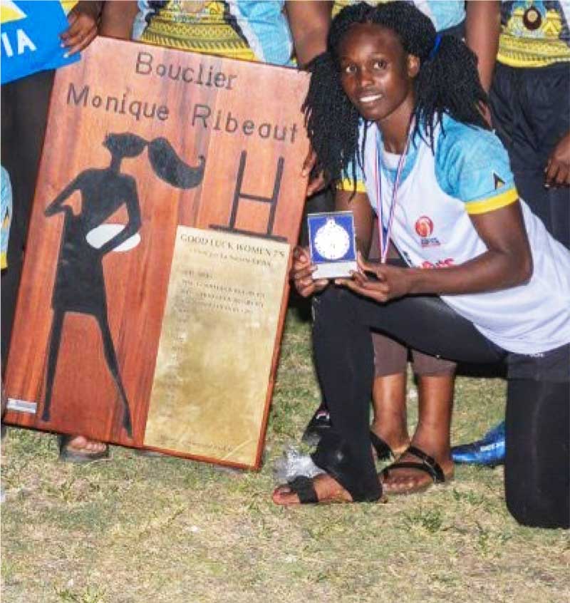 Nelta Samuels shows off one of her Prize Awards …